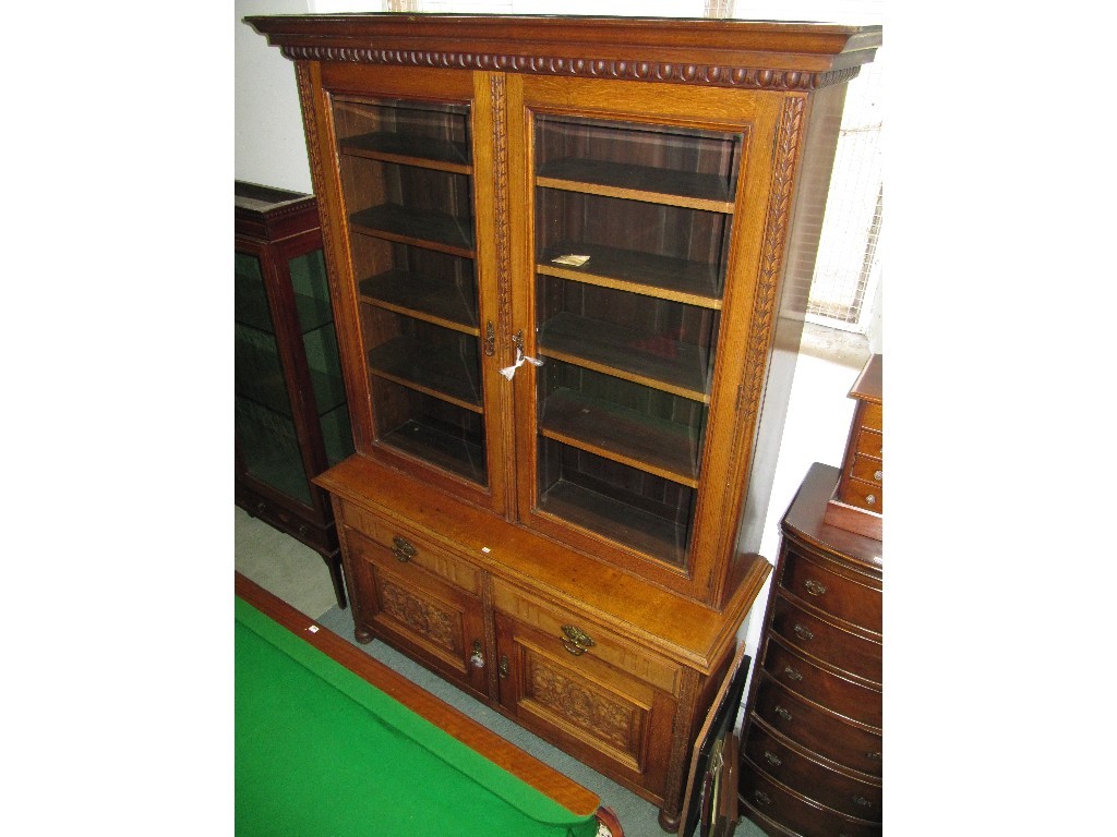 Appraisal: Victorian oak library bookcase on cupboard base