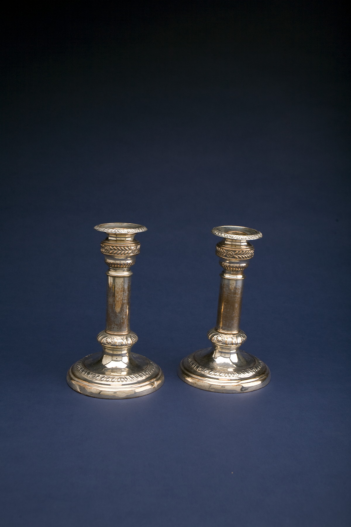 Appraisal: PAIR OF ENGLISH SHEFFIELD PLATE TELESCOPING CANDLESTICKS CIRCA Each socket