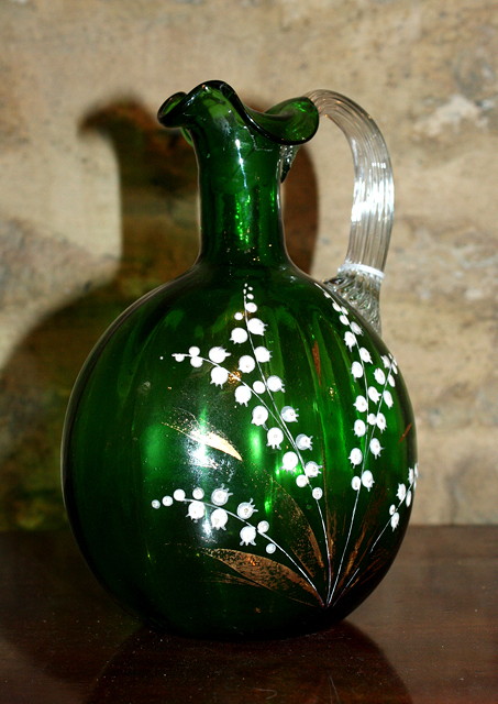 Appraisal: A MARY GREGORY STYLE GREEN GLASS EWER decorated Lily of