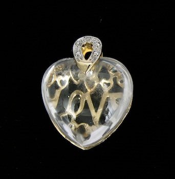 Appraisal: A Quartz and Diamond Love Pendant Back of this smoothly