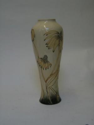 Appraisal: A MOORCROFT POTTERY VASE dated of tall baluster form tube