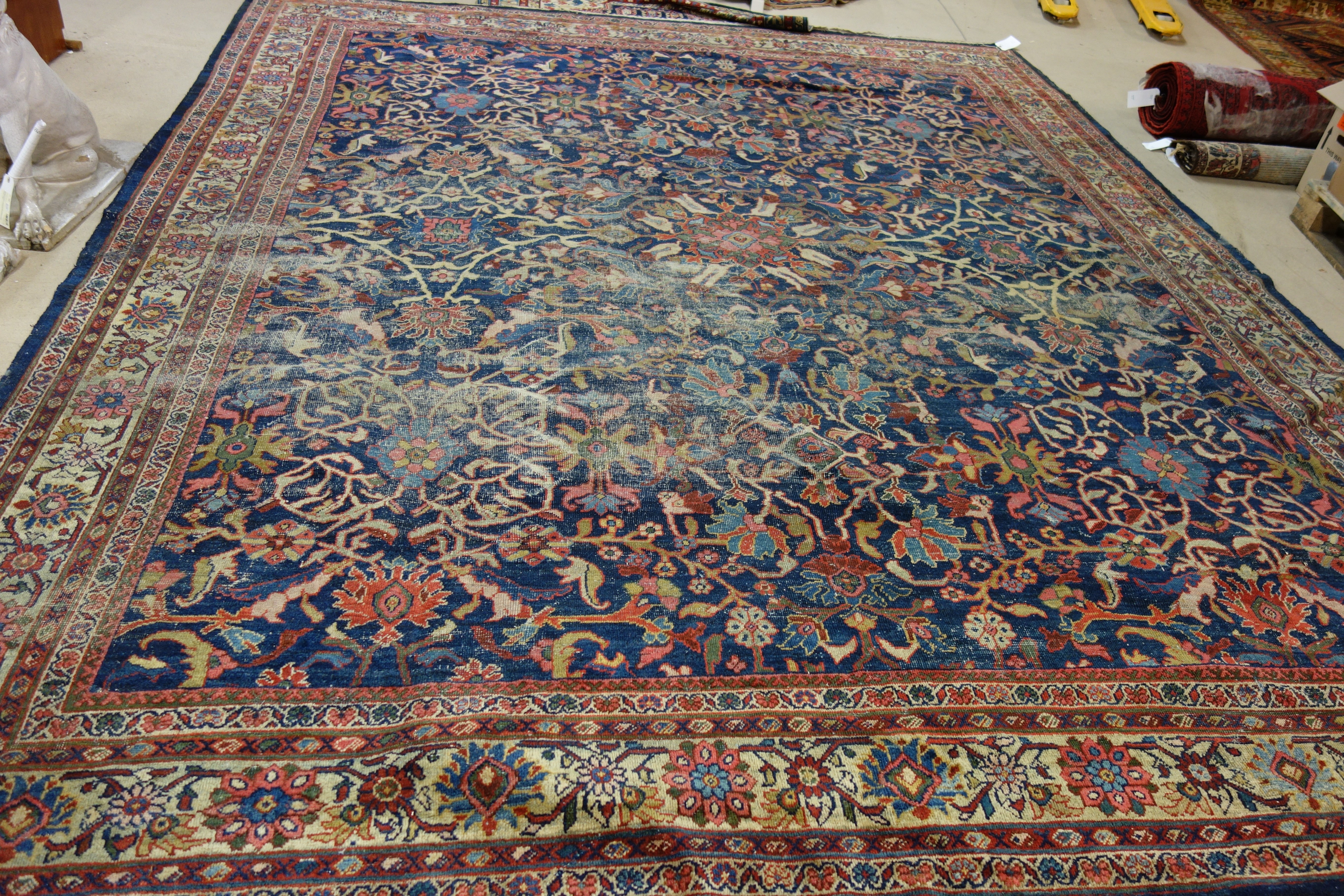 Appraisal: A Mahal carpet Persian the dark indigo field with a