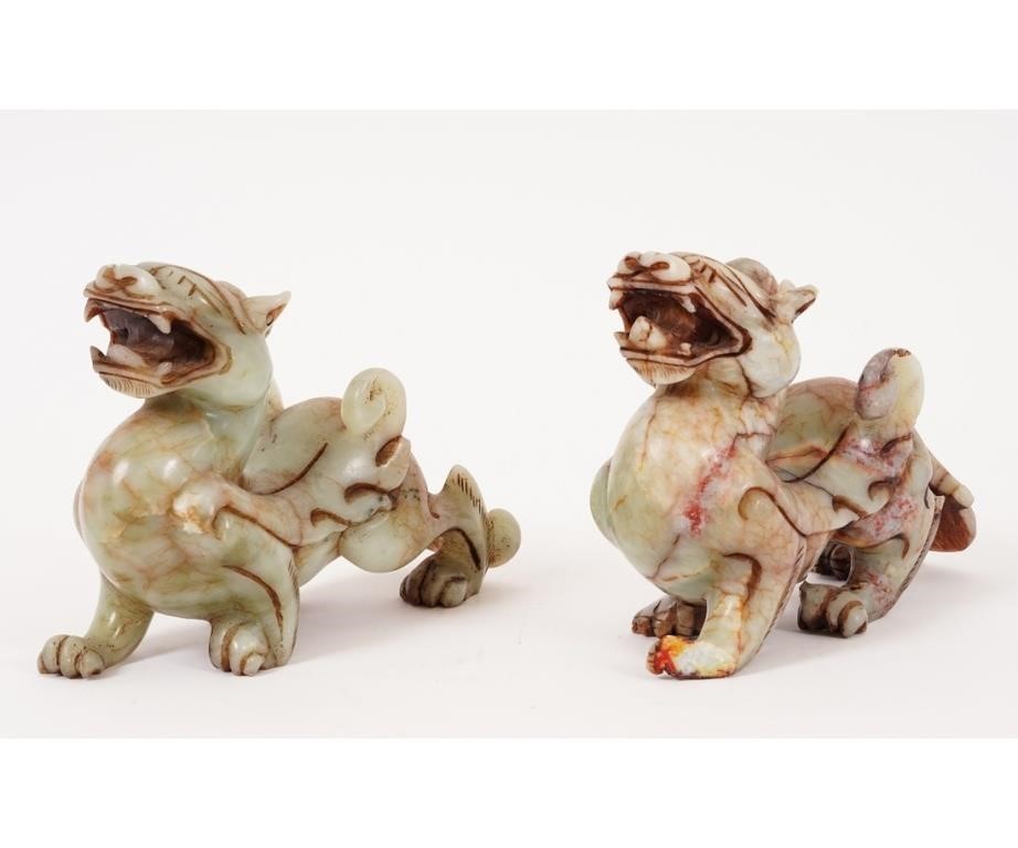 Appraisal: Pair of carved jade Foo dogs th c h x