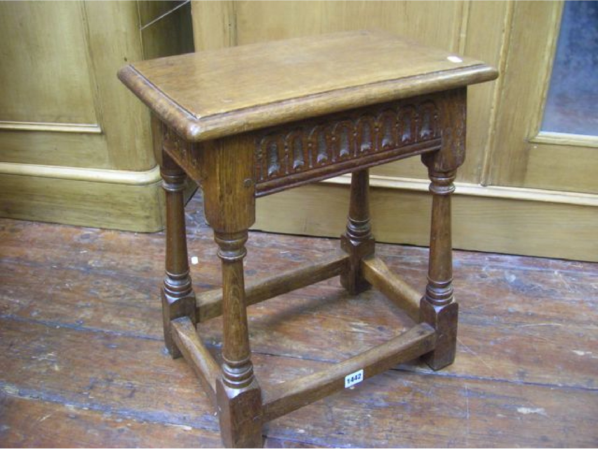 Appraisal: An Old English style oak coffin or joint stool with