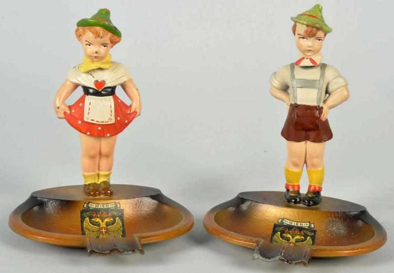 Appraisal: Pair of Austrian Figural Souvenir Ashtrays Circa s Painted diecast