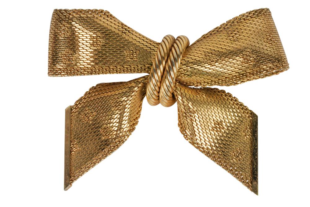 Appraisal: CHRISTIAN DIOR GOLD-PLATE COSTUME BOW BROOCH Christian Dior Made in