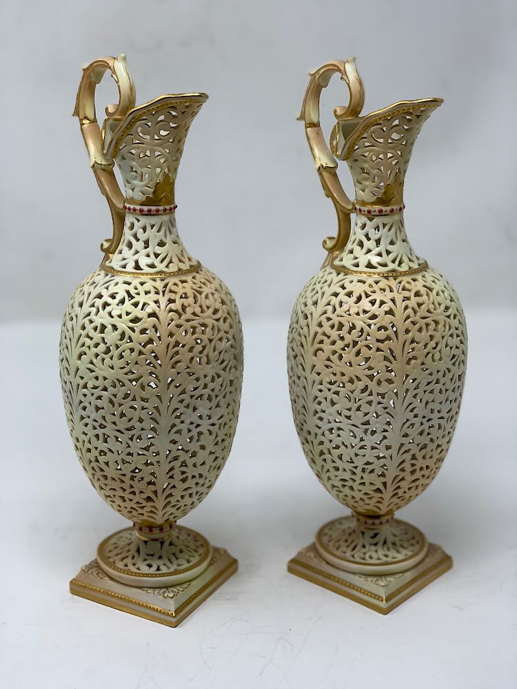 Appraisal: Pair Of Royal Worcester Reticulated Urns Pr Royal Worcester Reticulated