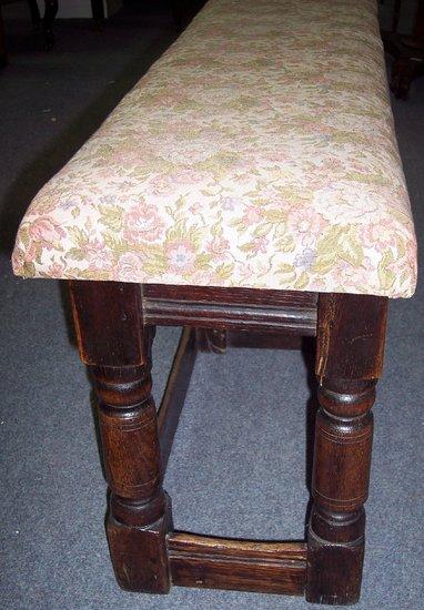 Appraisal: A rectangular stool on baluster supports united by square stretchers