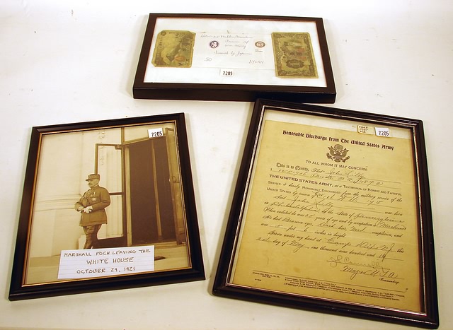 Appraisal: Lot consisting of an Army Discharge to a private in