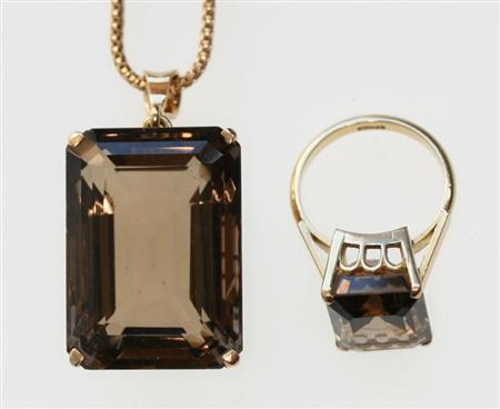 Appraisal: An ct gold ring set large smoky quartz of rectangular