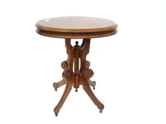 Appraisal: Oval Victorian Walnut Lamp Table with burl veneer top and