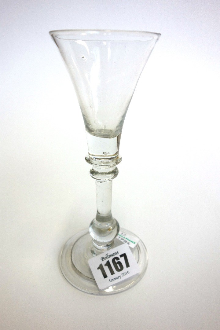 Appraisal: An English wine glass circa with trumpet bowl annulated knop