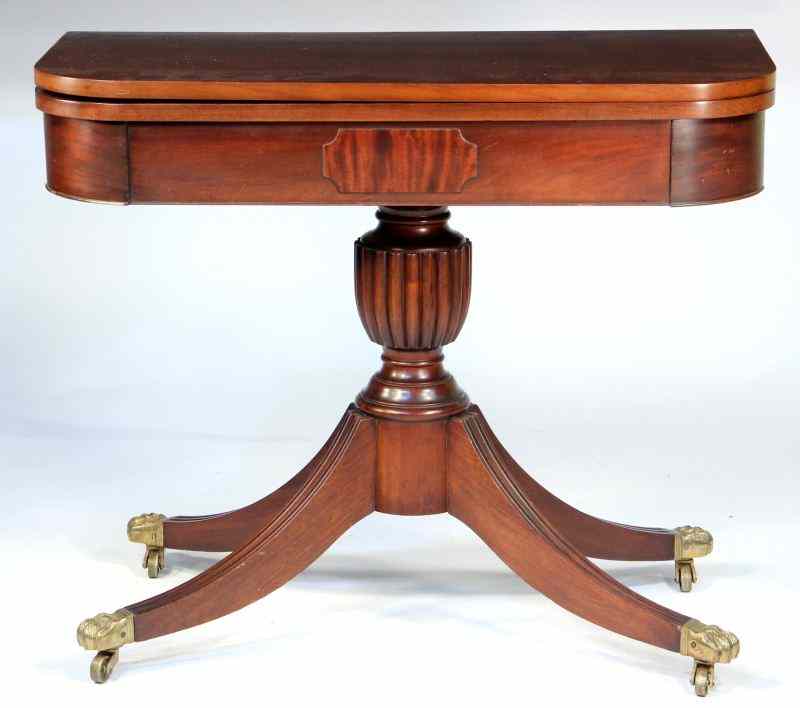 Appraisal: Contemporary Mahogany Game Tableflip top skirt with central inset panel