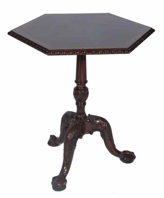 Appraisal: A CHIPPENDALE STYLE MAHOGANY HEXAGONAL OCCASIONAL TABLE with carved border