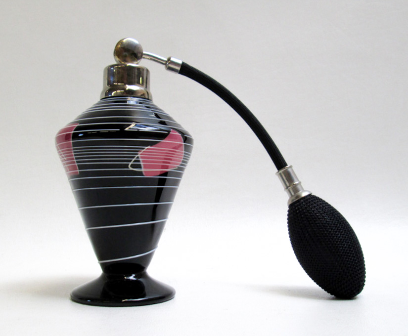 Appraisal: LUNDBERG STUDIOS ART GLASS PERFUME BOTTLE WITH ATOMIZER the footed