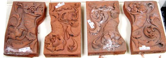 Appraisal: Four matching pieces of terracotta with cornucopia designs all measure