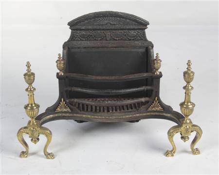 Appraisal: A George III cast iron and brass basket grate In