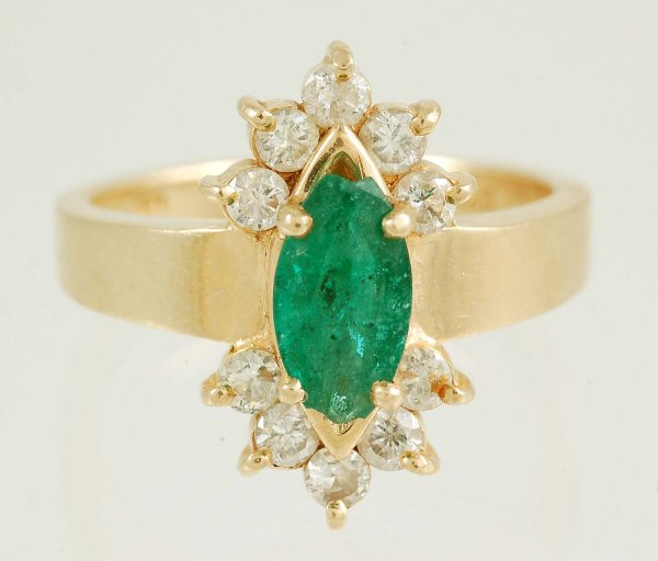 Appraisal: Emerald and diamond ring in marked K yellow gold One