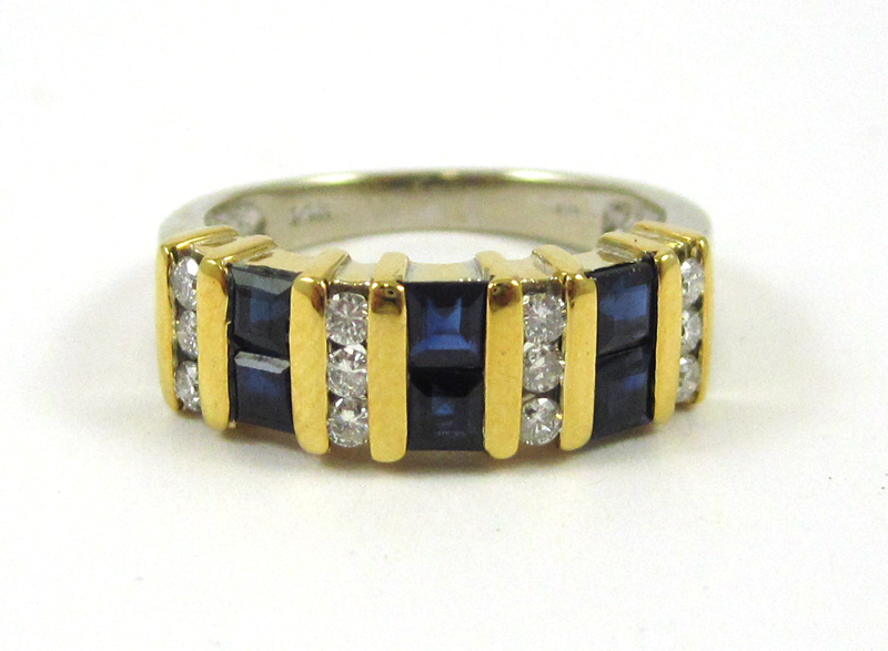 Appraisal: SAPPHIRE DIAMOND AND FOURTEEN KARAT GOLD RING The yellow and