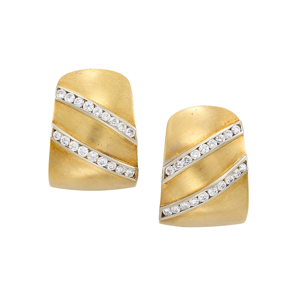 Appraisal: Pair of Gold and Diamond Earclips round diamonds ap cts