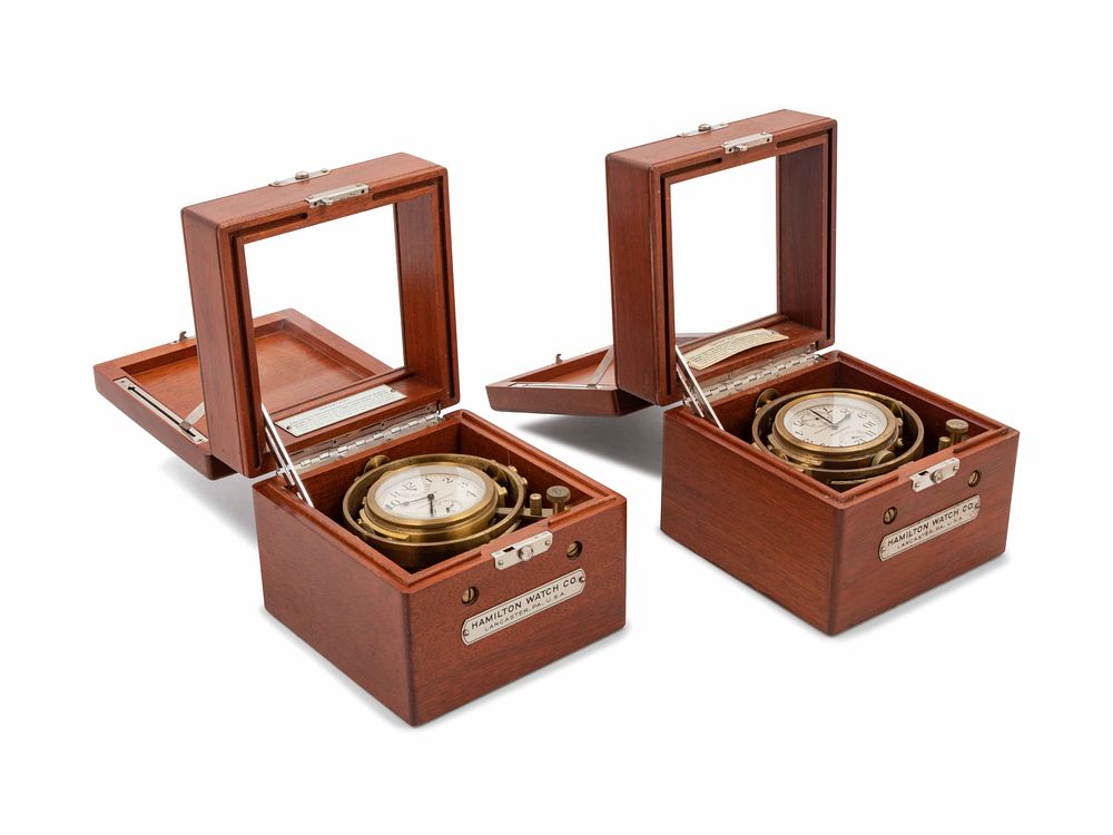 Appraisal: A Pair of American Mahogany Cased Two-Day Ship's Chronometers of