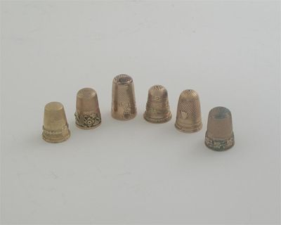 Appraisal: Six various gold thimbles