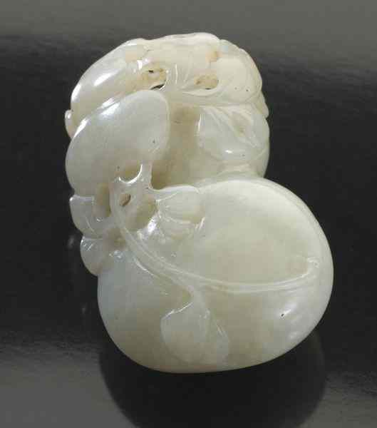 Appraisal: Chinese Qing carved jade pendantdepicting double gourds ''H Circa -