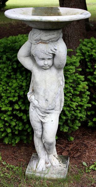 Appraisal: Cement Putti birdbath h x dia Good condition EST '