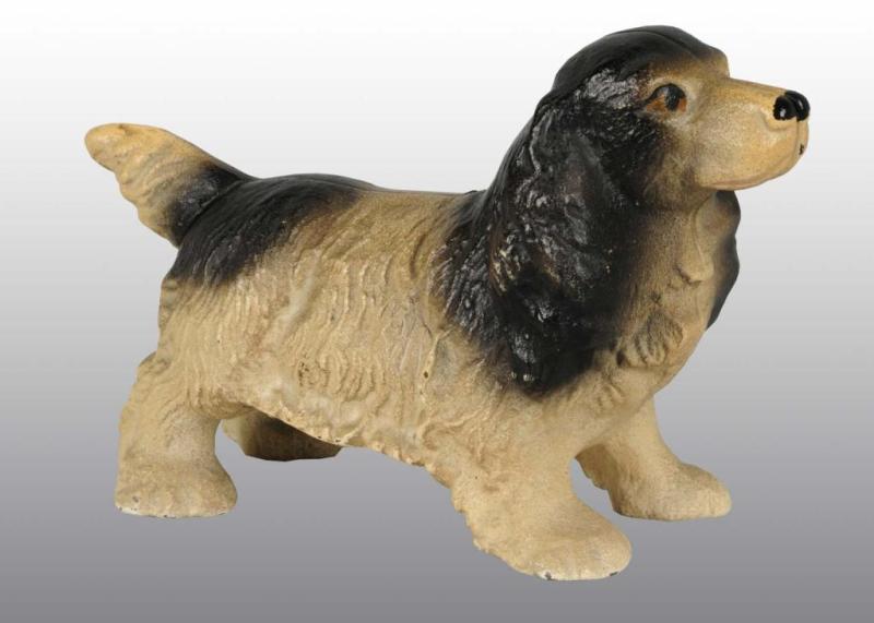 Appraisal: Cast Iron Spaniel with Trap Still Bank Description Manufactured by