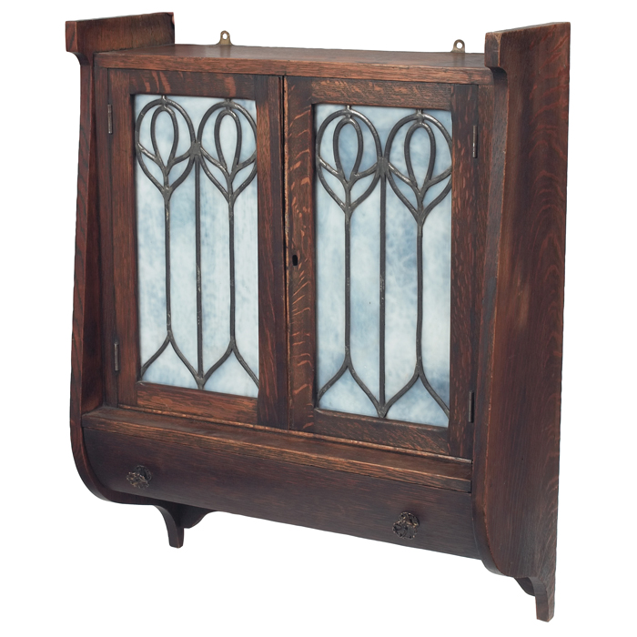 Appraisal: Shop of the Crafters hanging wall cabinet unusual form having