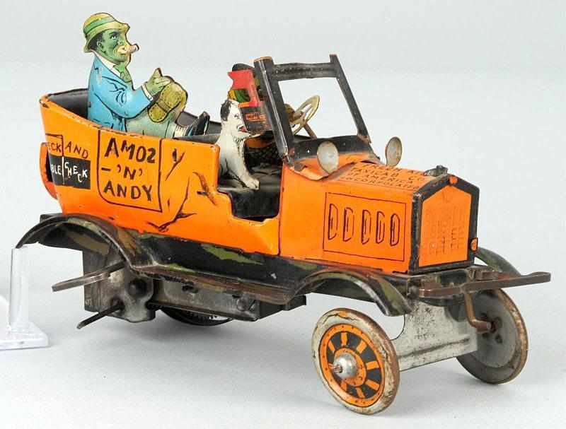 Appraisal: Tin Marx Amos 'N Andy Taxi Wind-Up Toy Description American