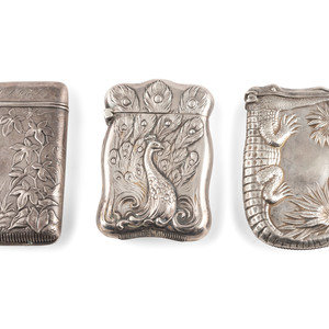 Appraisal: Three Silver Match Safes with Alligator Peacock and Stag Motifs