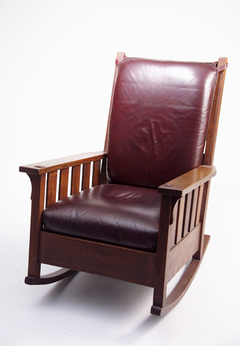 Appraisal: GUSTAV STICKLEY Rocker no with five slats under each arm