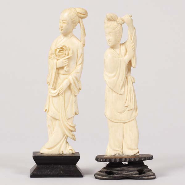 Appraisal: Two Chinese carved female figures attached on bases x x