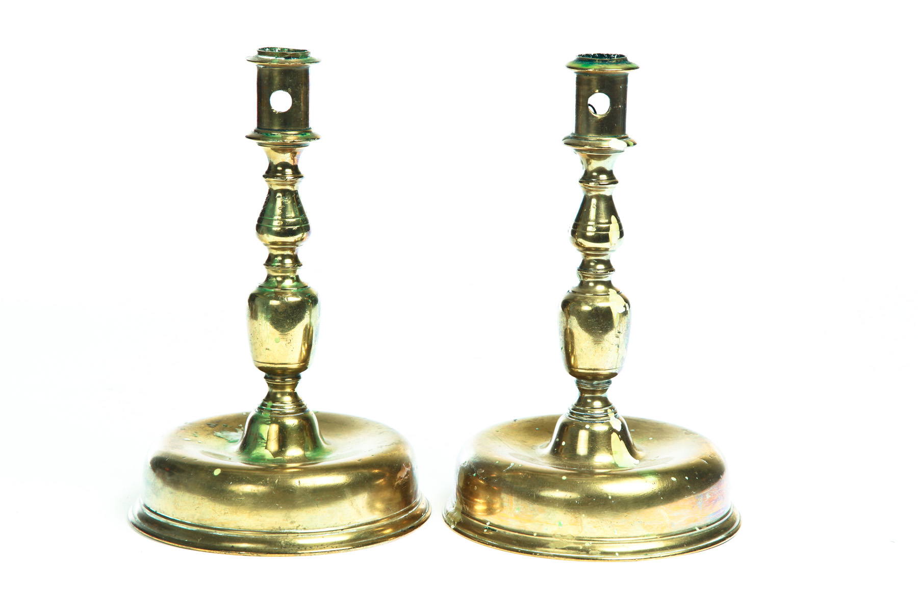 Appraisal: PAIR OF CONTINENTAL BRASS CANDLESTICKS Seventeenth- th century Domed bases