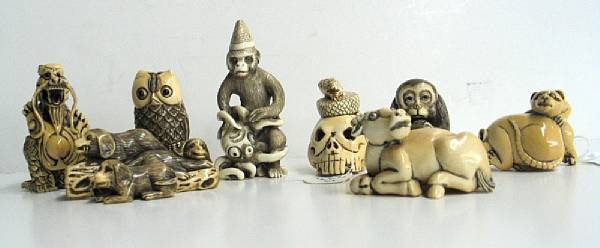 Appraisal: Fifteen Japanese and Japanese style ivory netsuke animal studies All