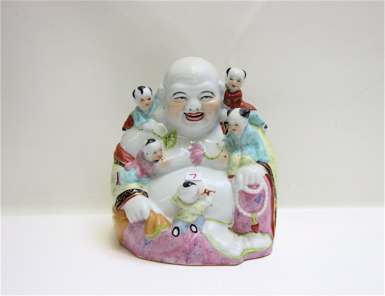 Appraisal: CHINESE REPUBLIC FAMILLE ROSE BUDDHA with a seated smiling Buddha