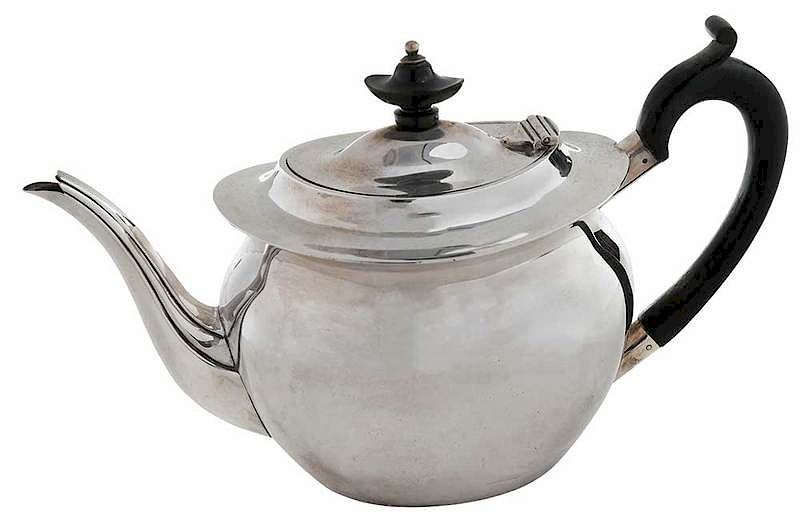 Appraisal: English Silver Teapot Sheffield oval shape black wooden handle and