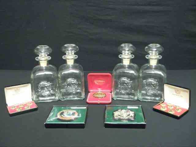 Appraisal: Four Italian glass liquor decanters Each has a metal figural