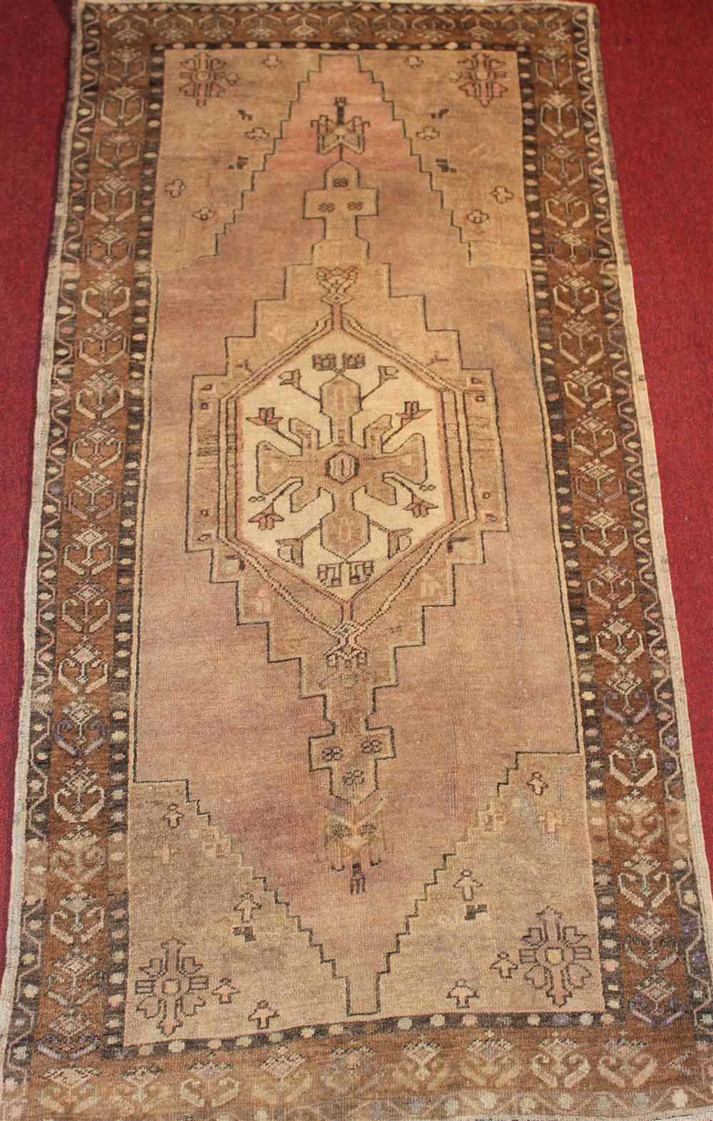 Appraisal: OUSHAK RUG approx ' x ' '' retail tag Provenance