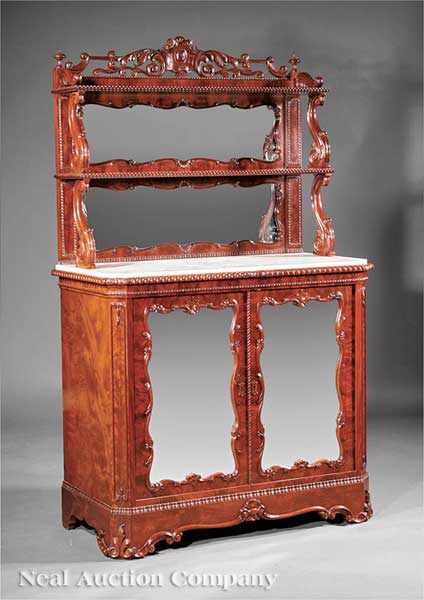 Appraisal: An American Rococo Carved Mahogany tag re Cabinet mid- th