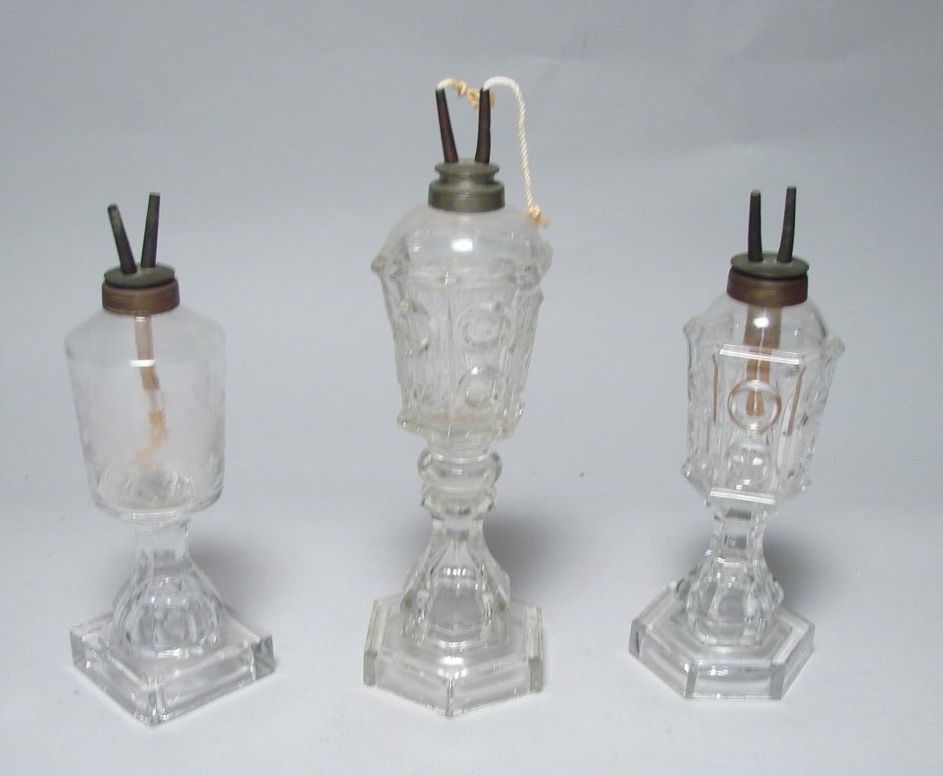 Appraisal: THREE ANTIQUE SANDWICH GLASS WHALE OIL LAMPS th CenturyTwo in