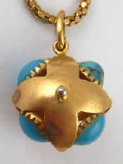 Appraisal: An antique carat gold turquoise pendant cm on a carat