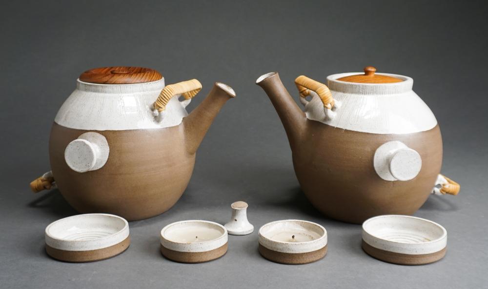 Appraisal: Pair Sture Ohlsson Ceramic Hanging Teapots with Teak Bases as