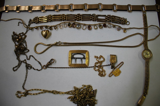 Appraisal: A COLLECTION OF MISCELLANEOUS CHAINS bracelets a ladies wrist watch