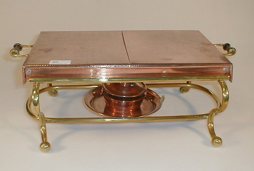 Appraisal: An early thC copper and brass warming tray having two