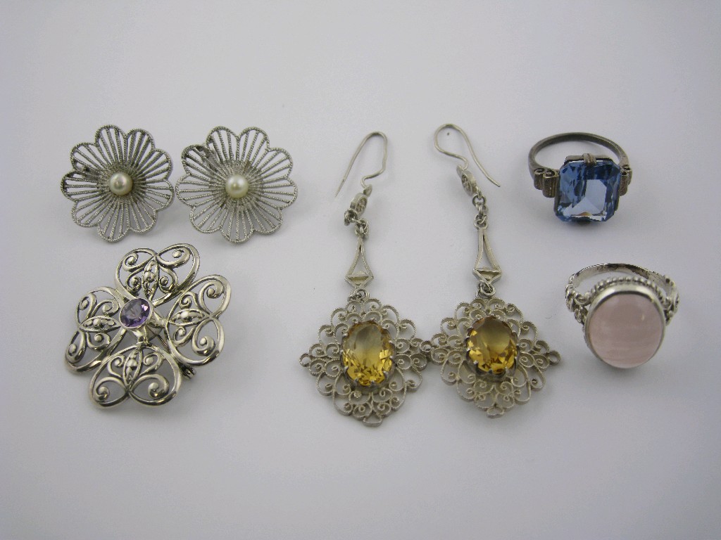 Appraisal: A pair of filigree Ear Pendants each claw-set oval-cut citrine