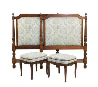 Appraisal: A PAIR OF FRENCH UPHOLSTERED WALNUT HEADBOARDS AND FOOT STOOLS