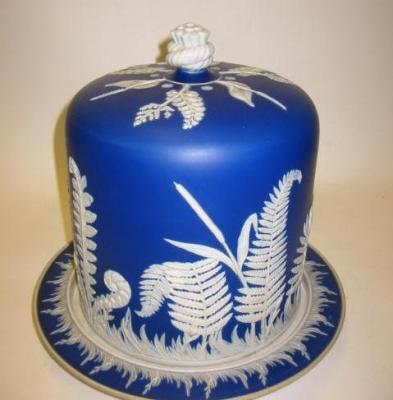 Appraisal: A VICTORIAN STONEWARE CHEESE DOME AND STAND blue smear glazed