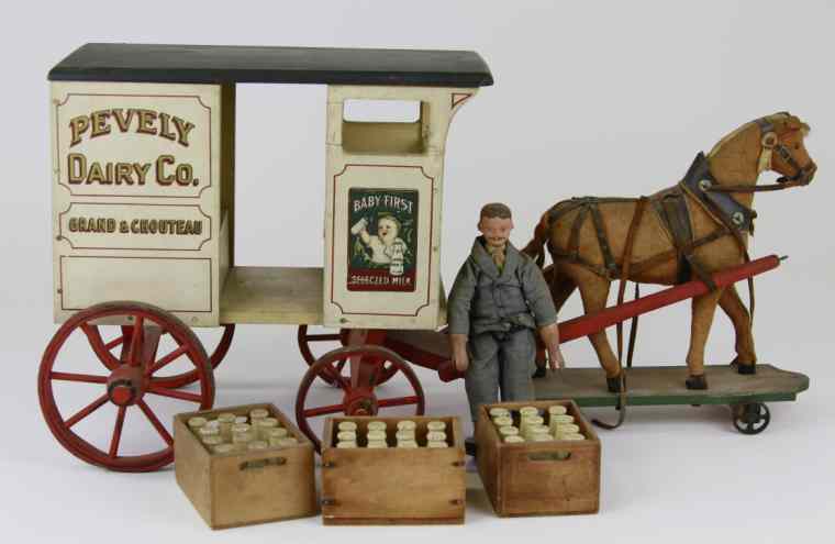 Appraisal: SCHOENHUT ''PEVELY'' MILK WAGON Very rare example this scarce Schoenhut